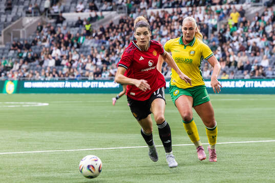 Dominique Janssen of Manchester United and Cathinka
