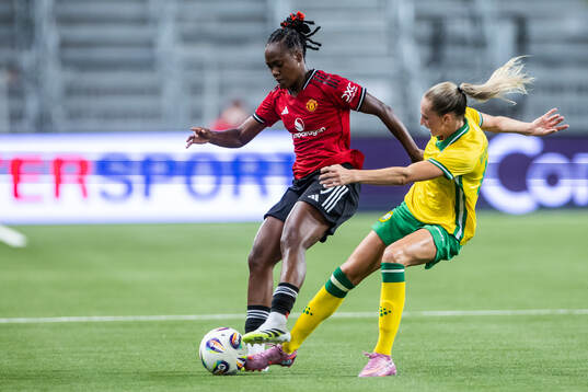 Melvine Malard of Manchester United and Ellen Wangerheim of