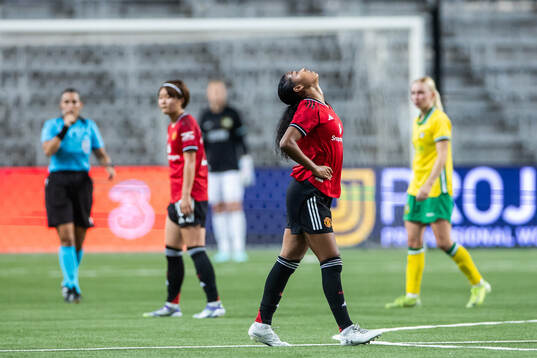 Jayde Riviere of Manchester United in pain