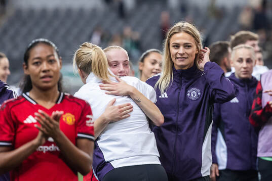 Anna Sandberg and Fridolina Rolfö of Manchester United