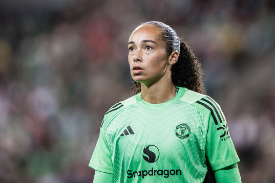 Goalkeeper Phallon Tullis-Joyce of Manchester United