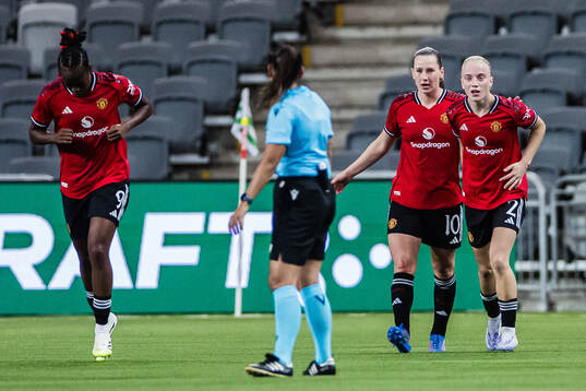 Elisabeth Terland and Anna Sandberg of Manchester United