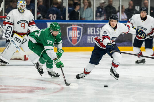 Rögles Daniel Zaar och HV71s Lucas Lagerberg