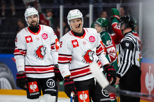 Fabian Heldner and Yannick Zehnder of Lausanne look dejected