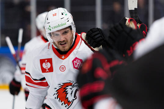Yannick Zehnder of Lausanne celebrates
