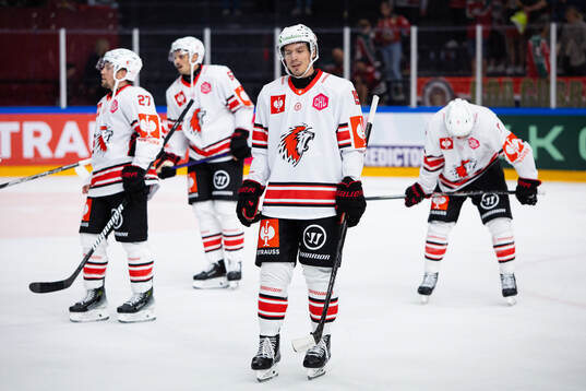Players of Lausanne look dejected