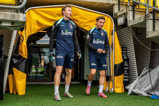 Goalkeeper Mathias Dyngeland and Patrick Berg of the