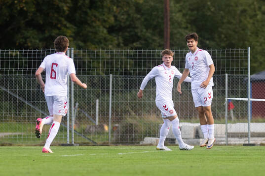 Julius Lucena of Denmark celebrates