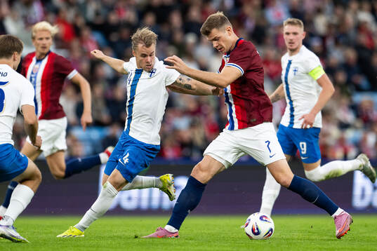 Robert Ivanov of Finland and Alexander Sørloth of Norway
