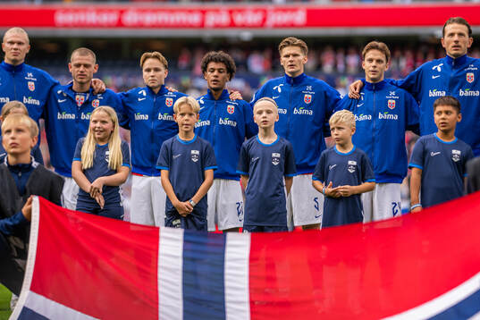 David Møller Wolfe, Felix Horn Myhre and players of Norway