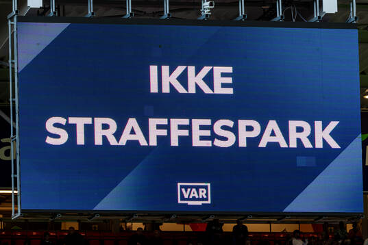 A screen shows a VAR check