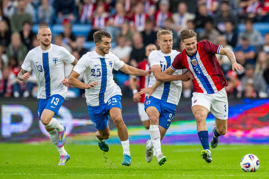 Adam Ståhl, Adam Marhiev and Topi Keskinen of Finland in