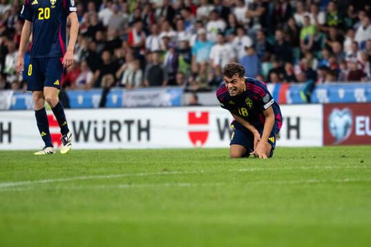 Yasin Ayari of Sweden in pain