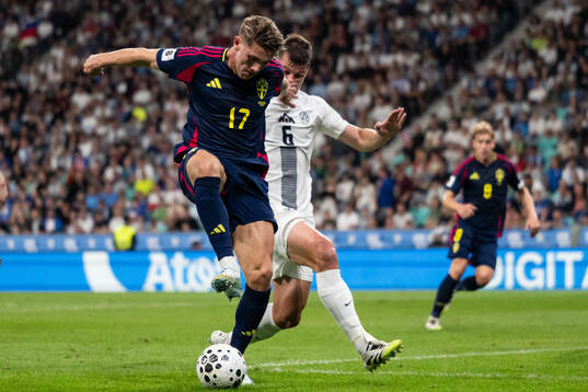 Viktor Gyökeres of Sweden and Jaka Bijol of Slovenia