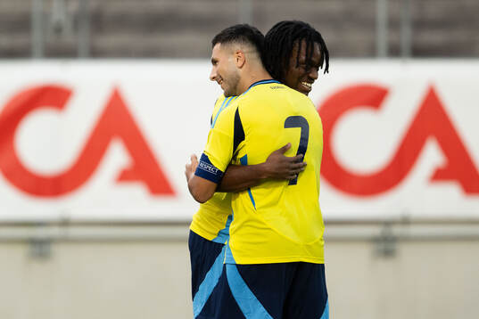 Jeremy Agbonifo of Sweden celebrates with Roony Bardghji