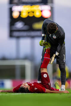 Mher Tarloyan receives help from goalkeeper Gor Matinyan of