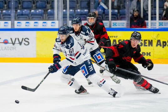 Linköpings Christoffer Ehn och Malmö Redhawks Filip