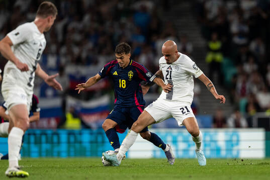 Yasin Ayari of Sweden and Vanja Drkusic of Slovenia