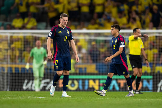 Viktor Gyökeres and Yasin Ayari of Sweden look dejected