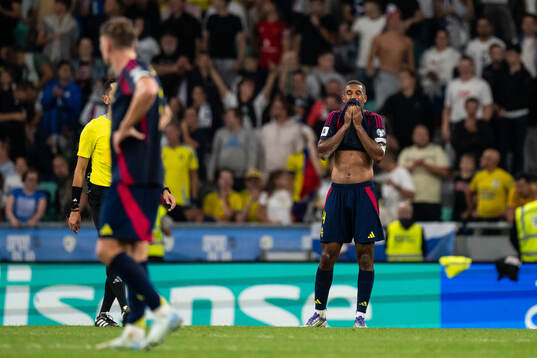 Isak Hien of Sweden looks dejected