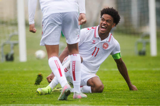 Malik Pimpong celebrates