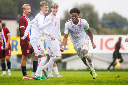 Malik Pimpong celebrates