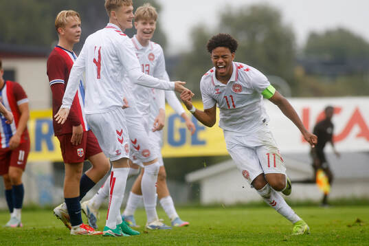 Malik Pimpong of Denmark celebrates