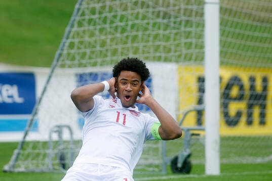 Malik Pimpong of Denmark celebrates