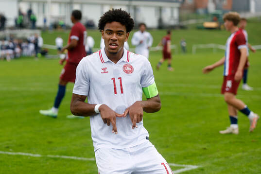 Malik Pimpong of Denmark celebrates