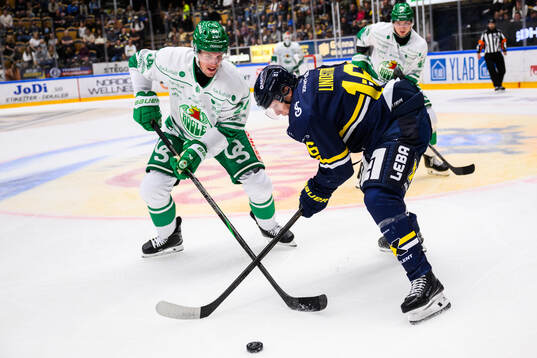 Rögles Mattias Göransson och HV71s Linus Lindström