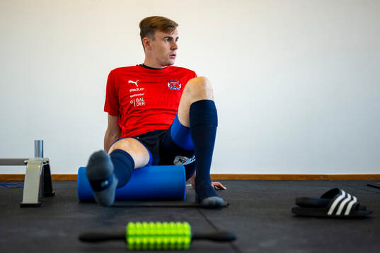 Åstorps FFs spelare stretchar