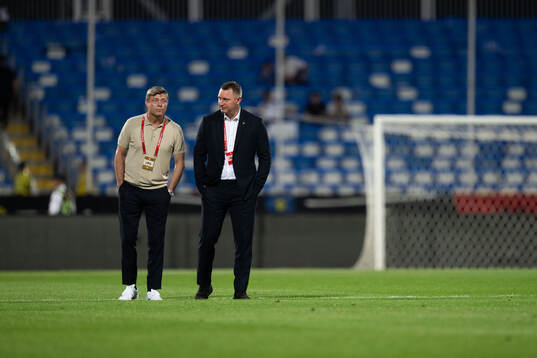 Head coach Jon Dahl Tomasson of Sweden and Kim Källström,
