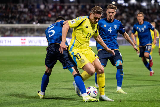 Lumbardh Dellova and Ilir Krasniqi of Kosovo against Viktor