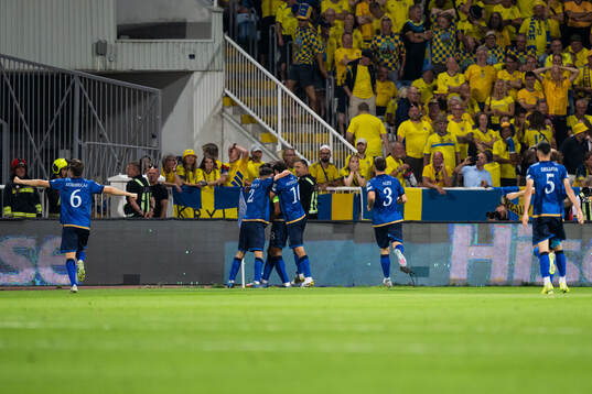 Players of Kosovo celebrate