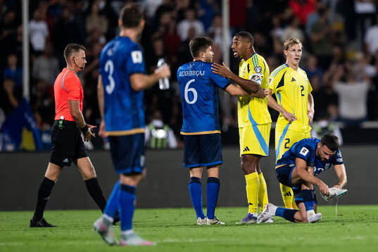 Elvis Rexhbecaj of Kosovo and Isak Hien of Sweden