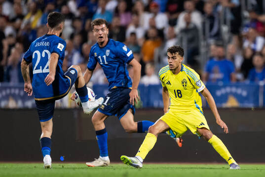 Muharrem Jashari and Fisnik Asllani of Kosovo against Yasin
