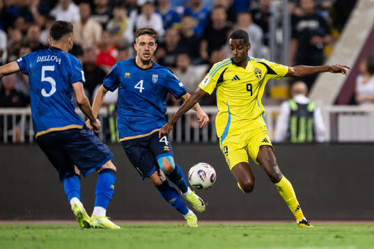 Ilir Krasniqi of Kosovo and Alexander Isak of Sweden