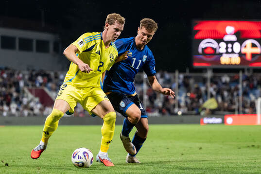 Emil Krafth of Sweden and Fisnik Asllani of Kosovo