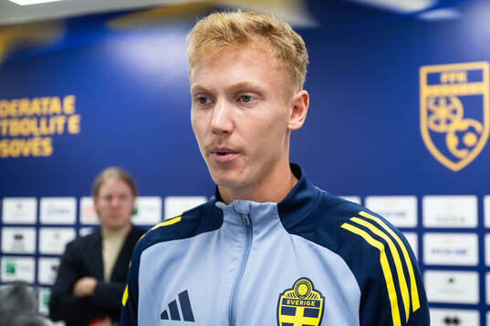 Hugo Larsson of Sweden in mixed zone