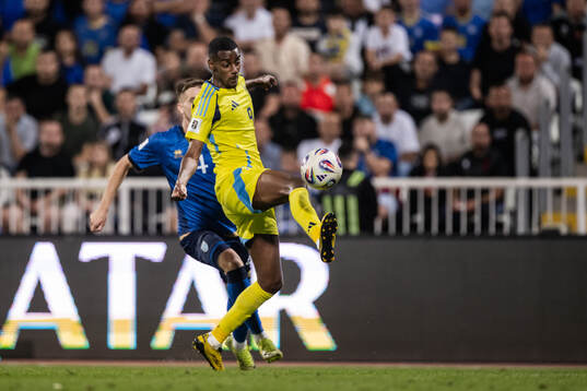 Ilir Krasniqi of Kosovo and Alexander Isak of Sweden