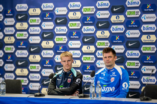 Martin Ødegaard and press officer Morten Morisbak