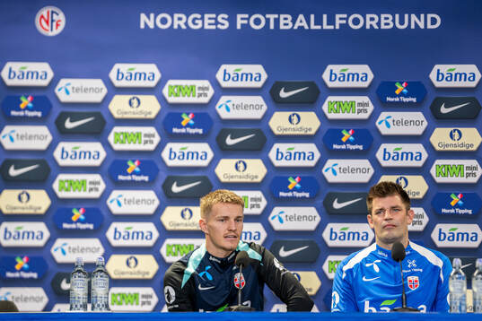 Martin Ødegaard and press officer Morten Morisbak