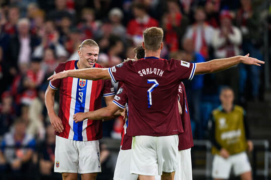 Erling Braut Haaland of Norway celebrate with teammates