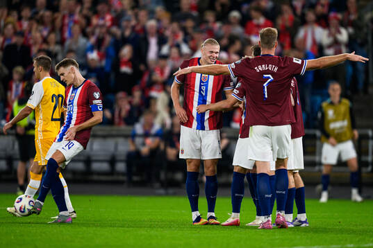 Erling Braut Haaland of Norway celebrate with teammates