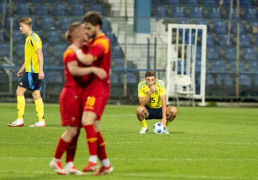 Jona Rouhi of Sweden looks dejected