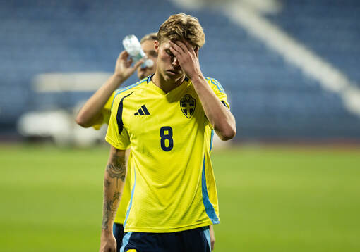 Lukas Björklund of Sweden looks dejected