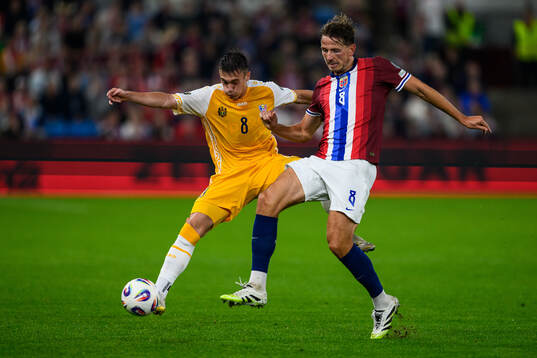 Nichita Motpan of Moldova  and Sander Berge of Norway