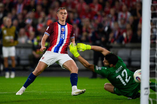 Thelo Aasgaard of Norway scores the 7-0 goal