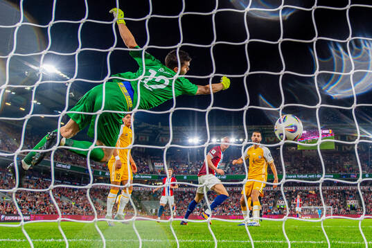 Erling Braut Haaland of Norway scores the 6-0 goal behind