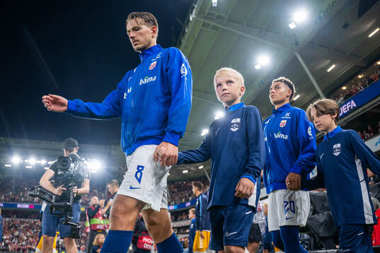 Sander Berge and Antonio Nusa of Norway enter the pitch